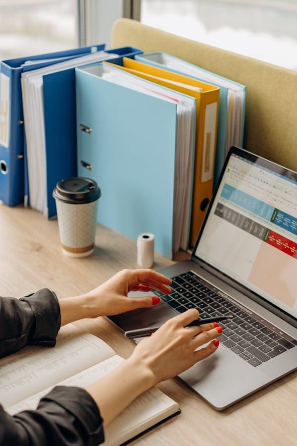 Image of a laptop with a spreadsheet